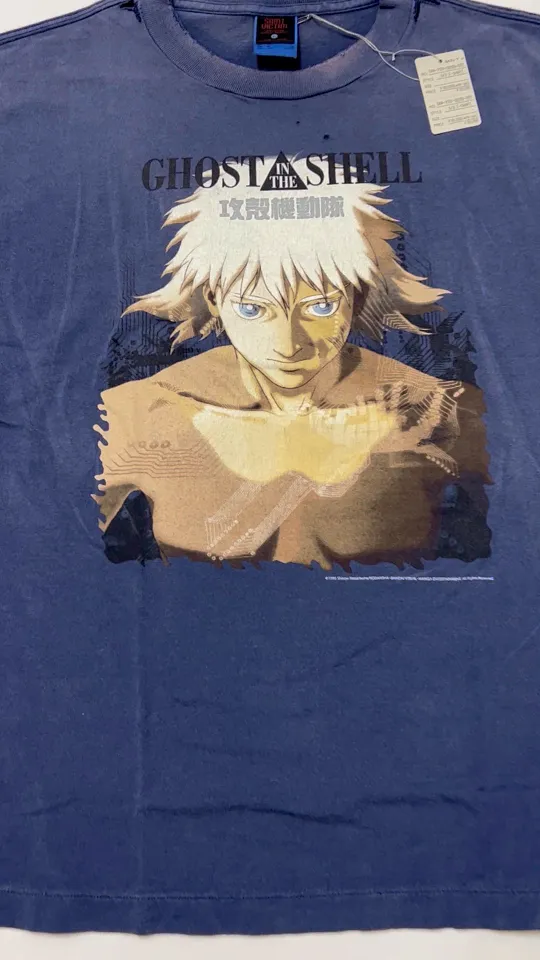 SAINT Mxxxxxx × Ghost in the Shell GS_SS TEE/GST IN THE SHELL/NVY Ghost in the Shell co-branded distressed short-sleeves White-haired plain character TEE Washed blue S-XL Look for the cylindrical fabric with no side seams. The open width is almost meaningless Asut ready-made garments dyed The whole piece is sprayed with horsetail. The collar and cuffs are faded. The collar and cuffs are frayed. Many hangings are worn. The oversized printing position restores the authenticity level. Customized joint main mark/wash mark/with little angel anti-counterfeiting mark